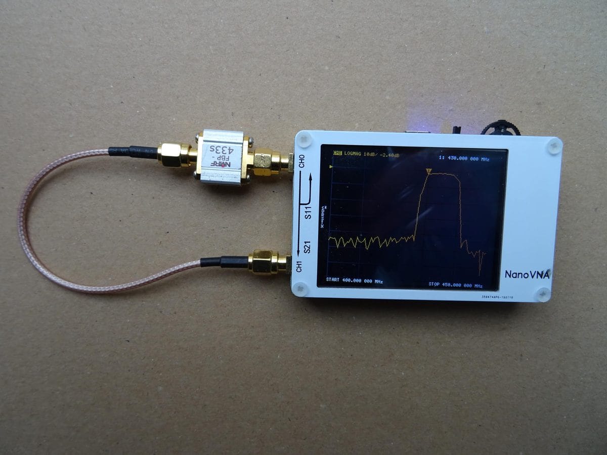 NanoVNA measuring a 433 MHz SAW filter showing the S-parameter response