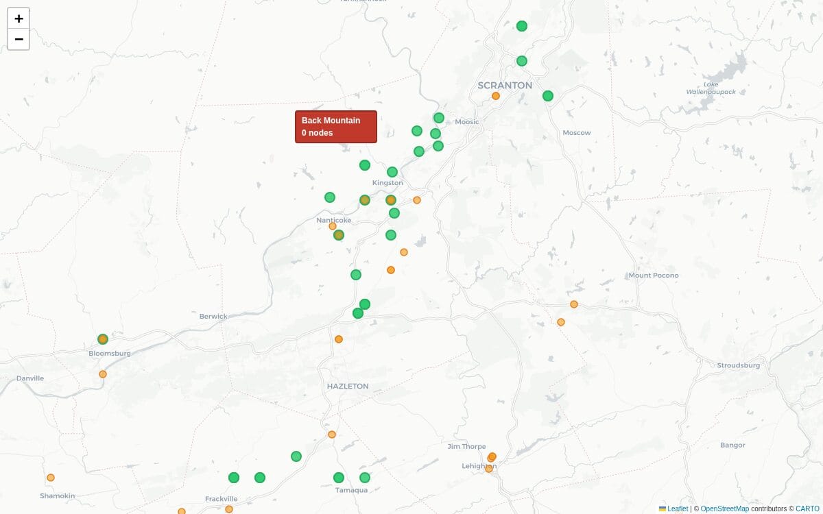 NEPAMesh node map showing the Wyoming Valley cluster with an empty Back Mountain plateau to the northwest. Green dots are active nodes; orange are stale. Back Mountain is labeled with zero nodes.