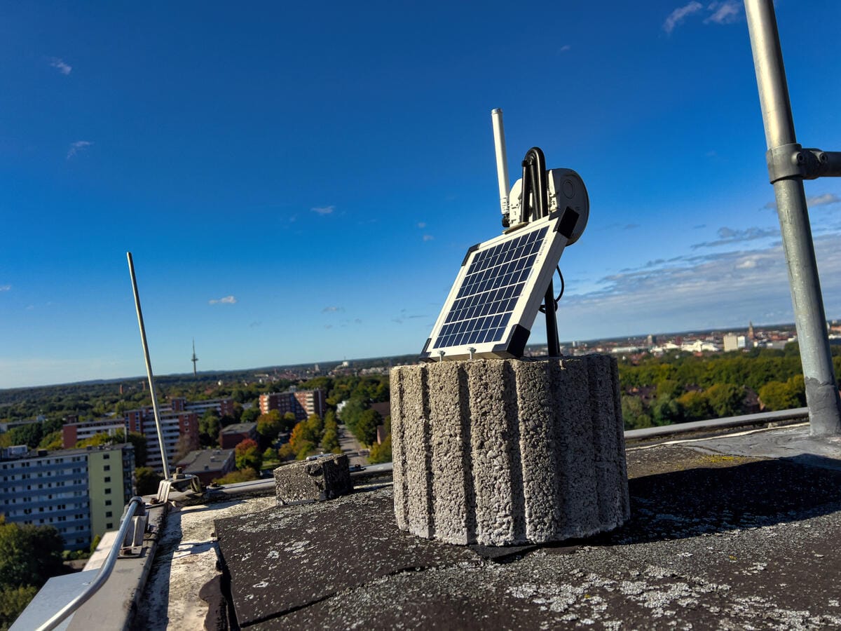 A solar-powered MeshCore repeater built on a RAK4631 board, mounted on a roof for 868MHz coverage.