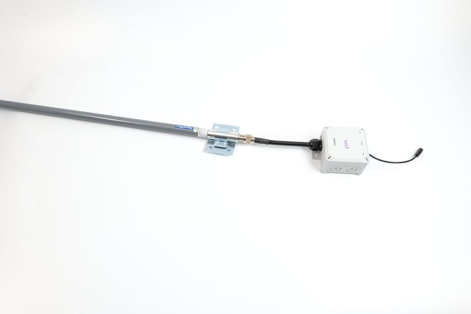 Meshtastic node being assembled in a weatherproof enclosure for outdoor deployment