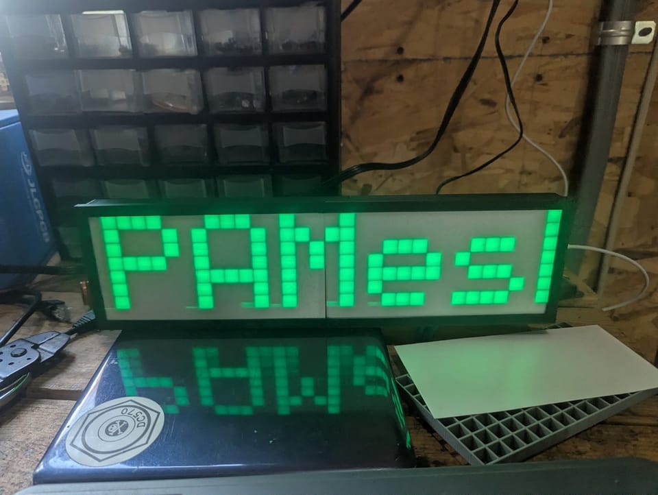 8x32 WS2812B LED matrix scrolling NEPAMesh messages in green